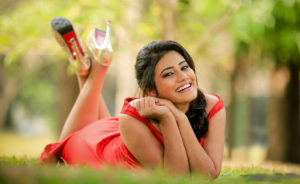 Shanudrie Priyasad in Short Orange Dress